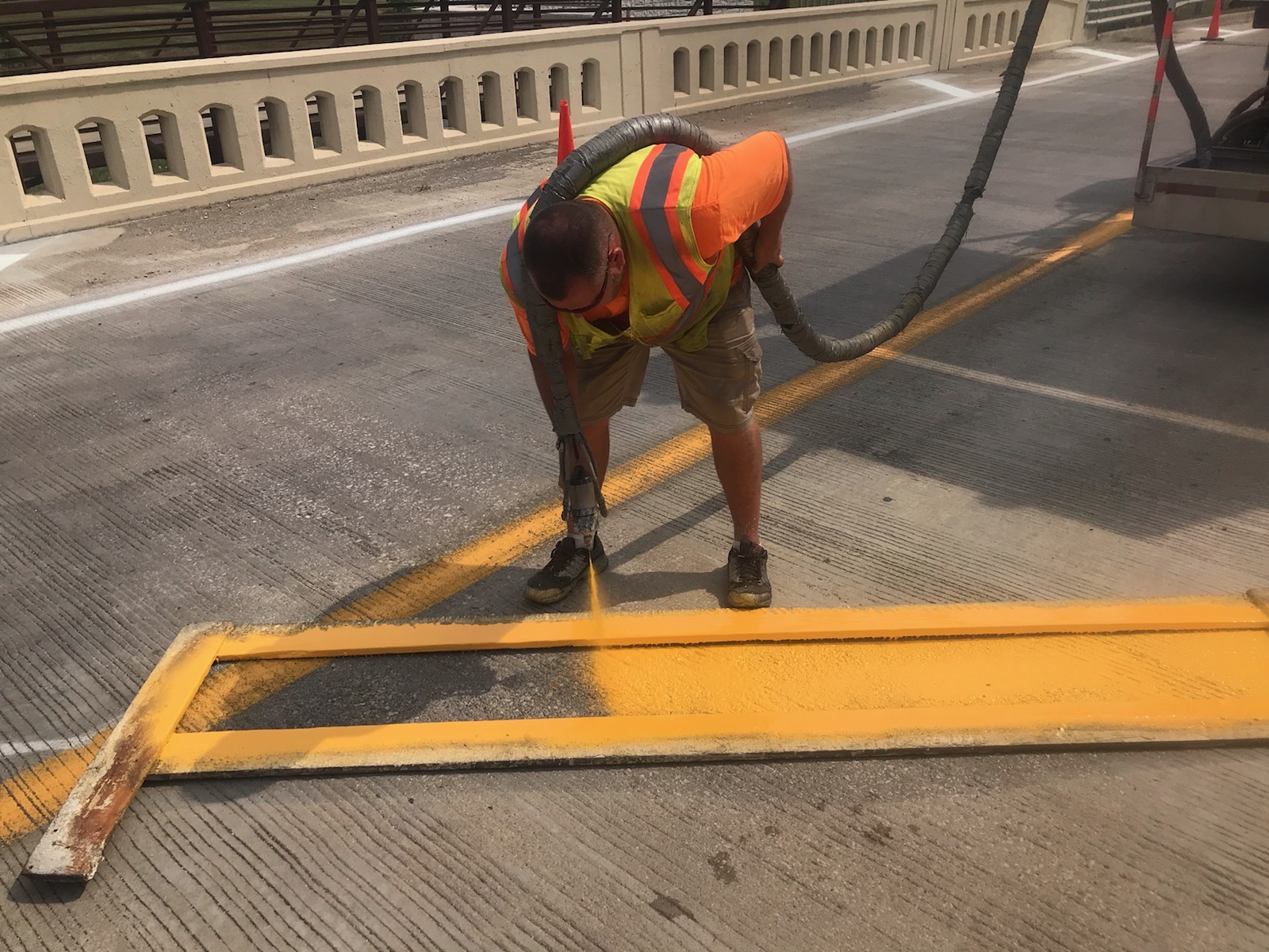 Laying down yellow paint lines